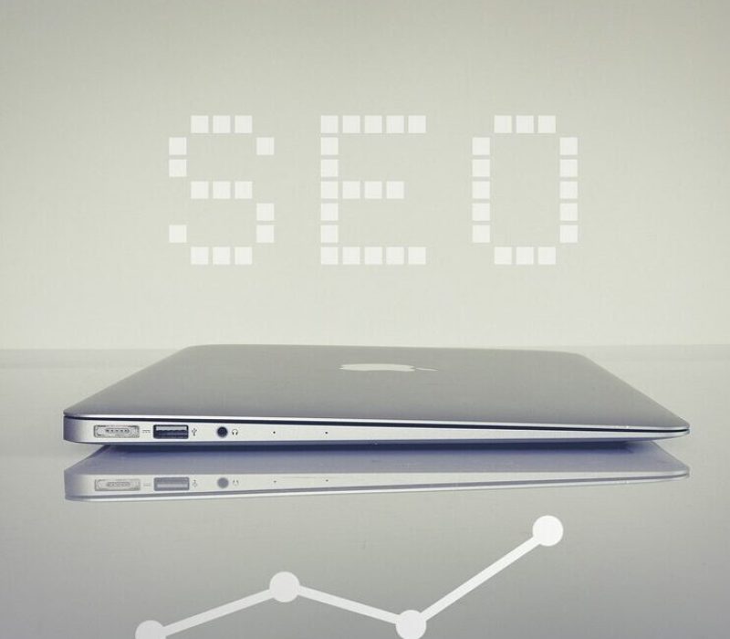 Laptop and text symbolizing SEO packages for small business